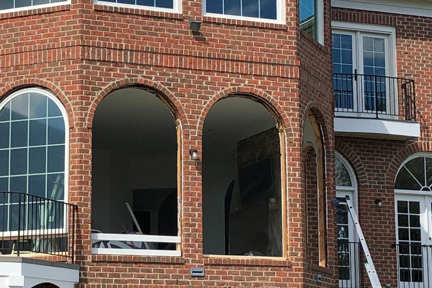 Rear exterior view of windows being replaced on the kaplar house.