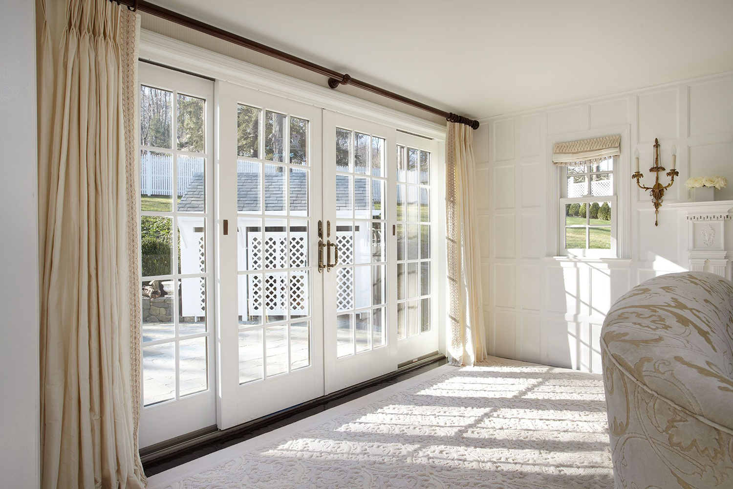 White french patio door in a living room.