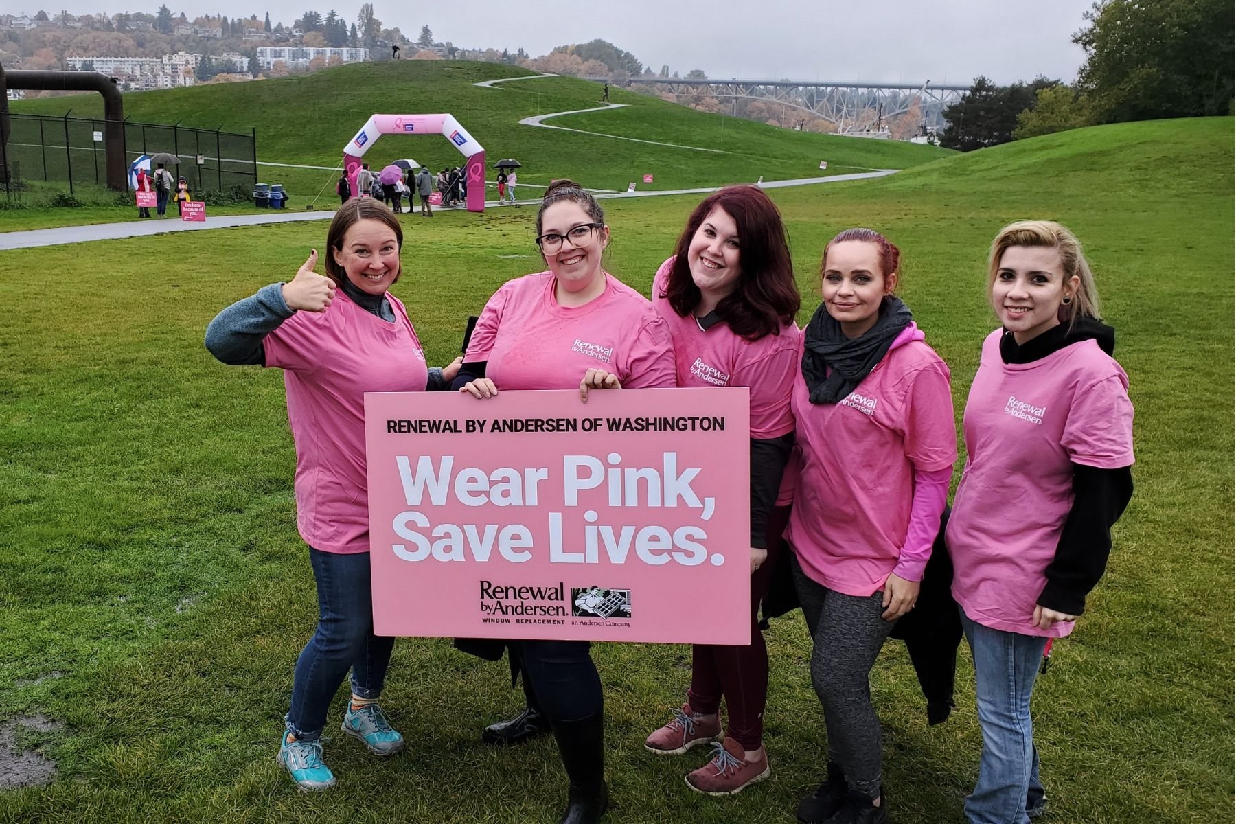 Group of women wearing pink shirts during Wear Pink, Save Lives walk.