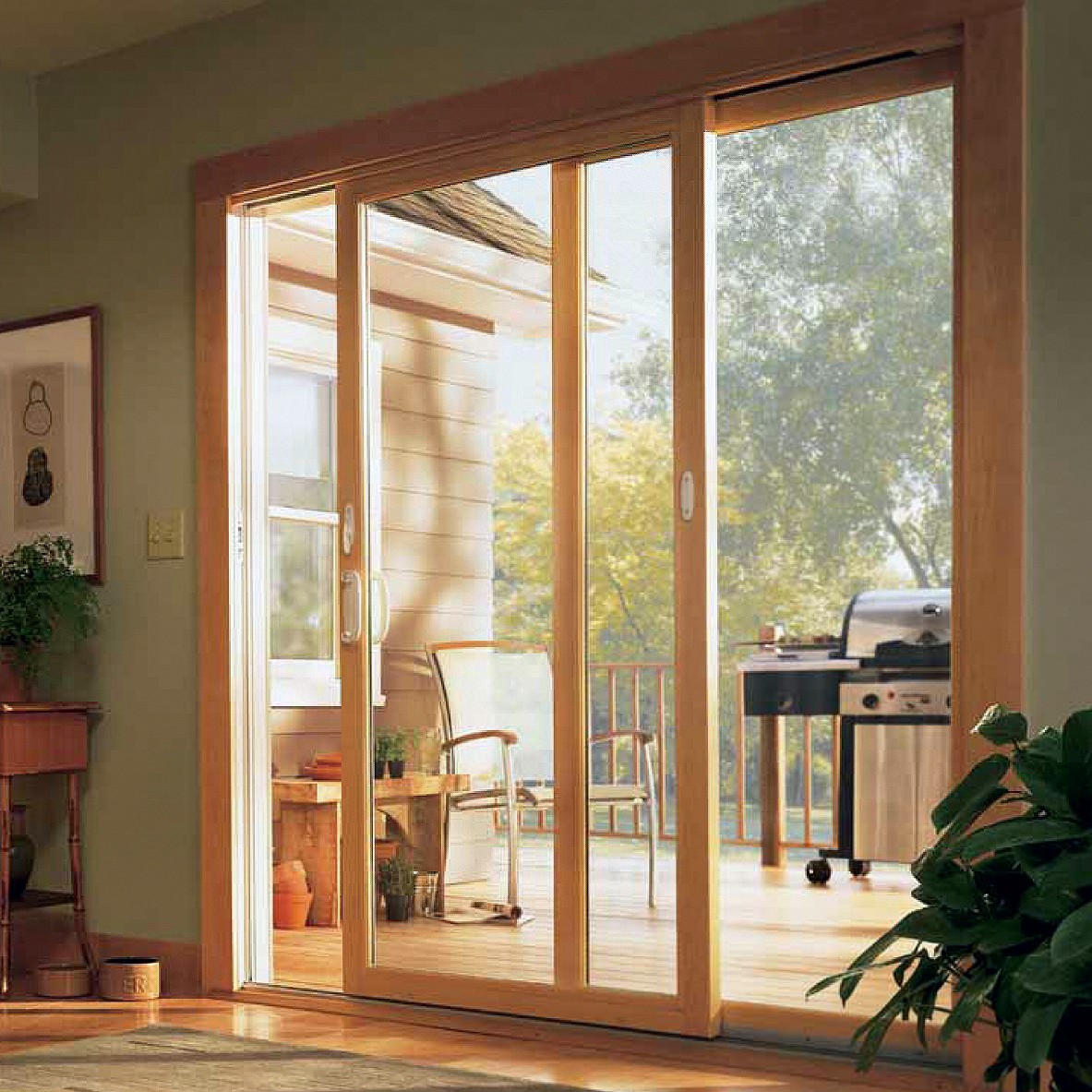 Narroline sliding glass doors in a kitchen. The room is filled with sunlight.