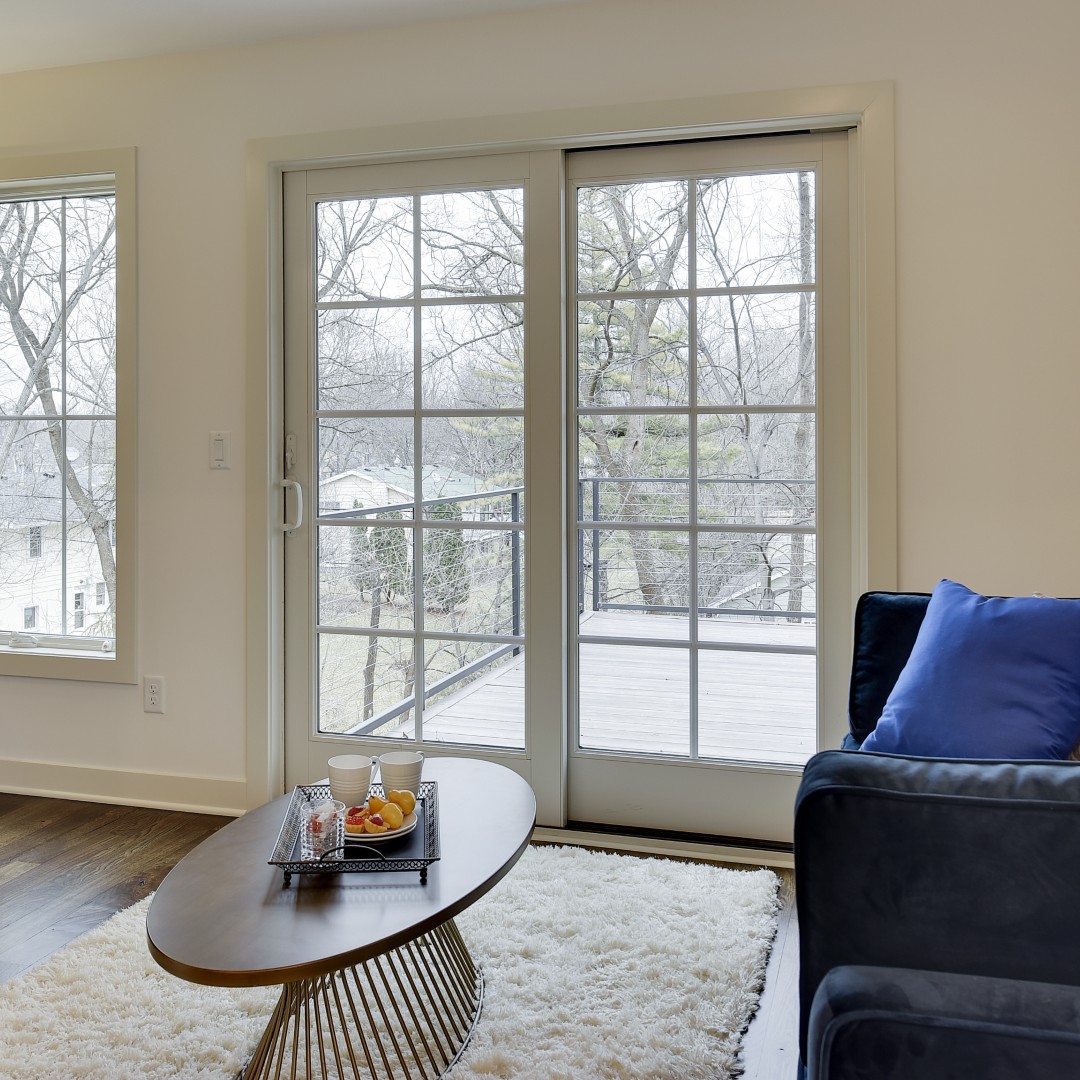 A sliding french door with equal lite grilles. The sliding door is a space saver.