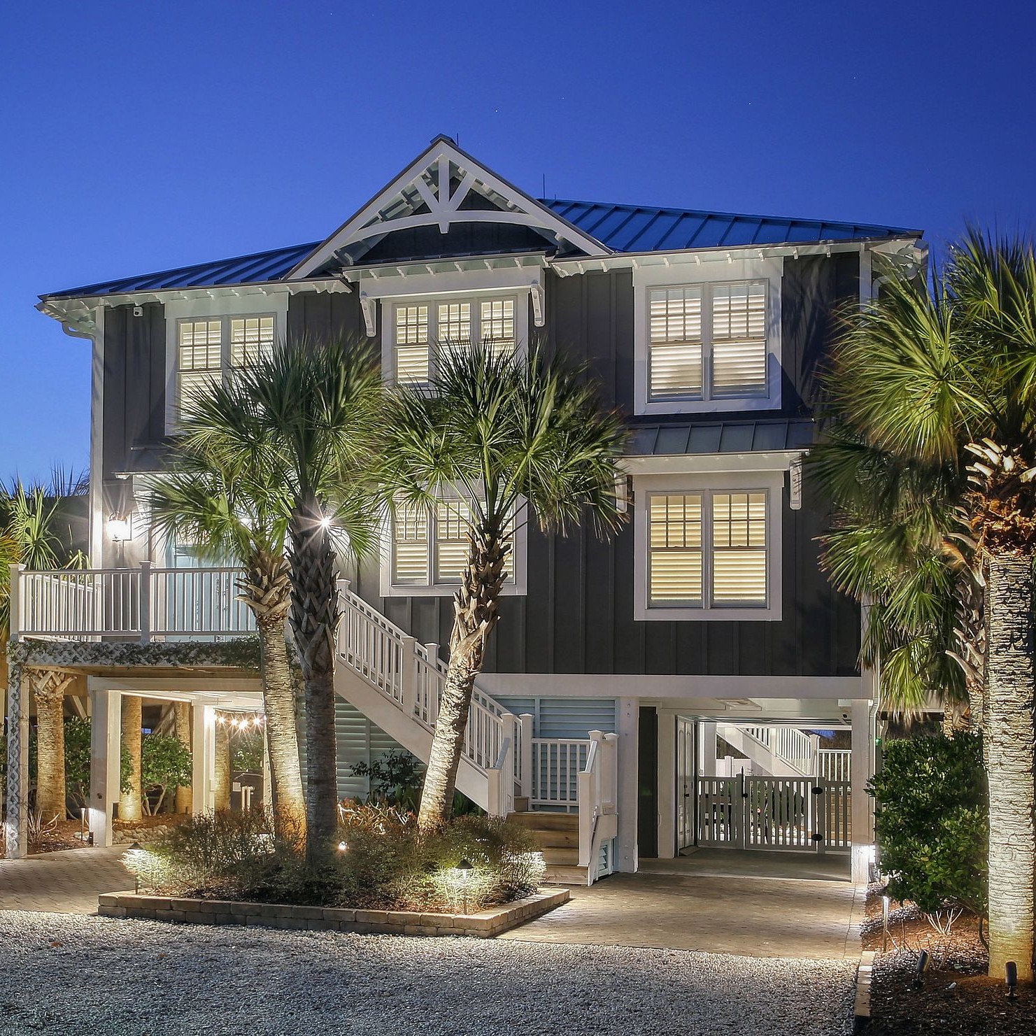 a lovely coastal home in the evening.