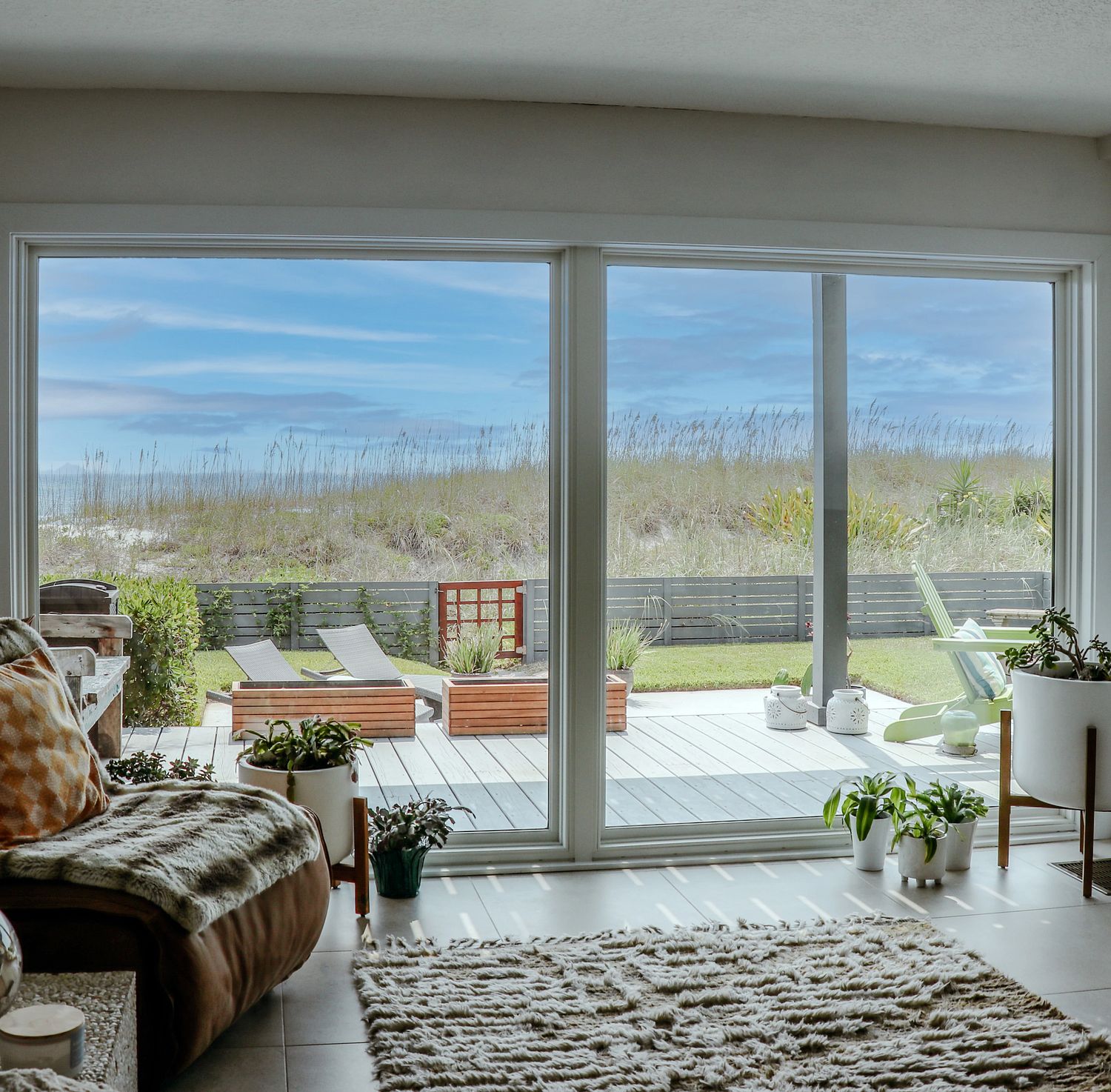 View of a coastal Marsh through picture windows.