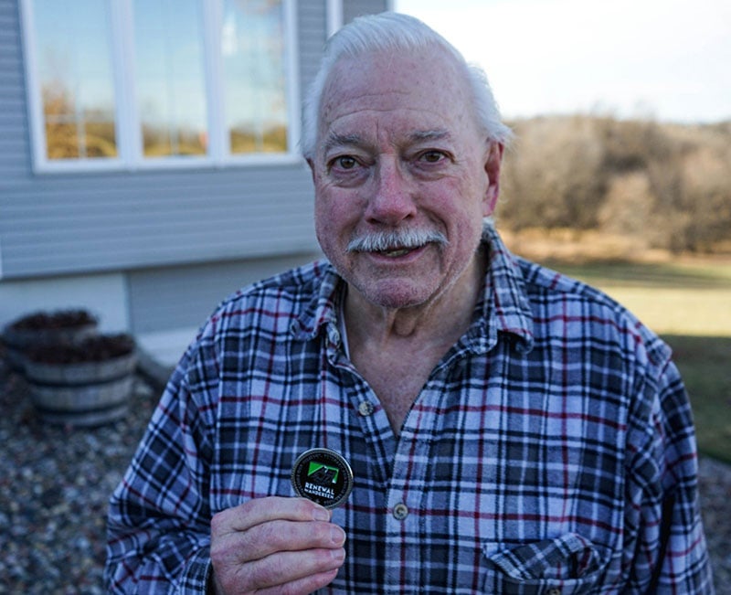 Craig Eckels RbA client with RBA veteran coin