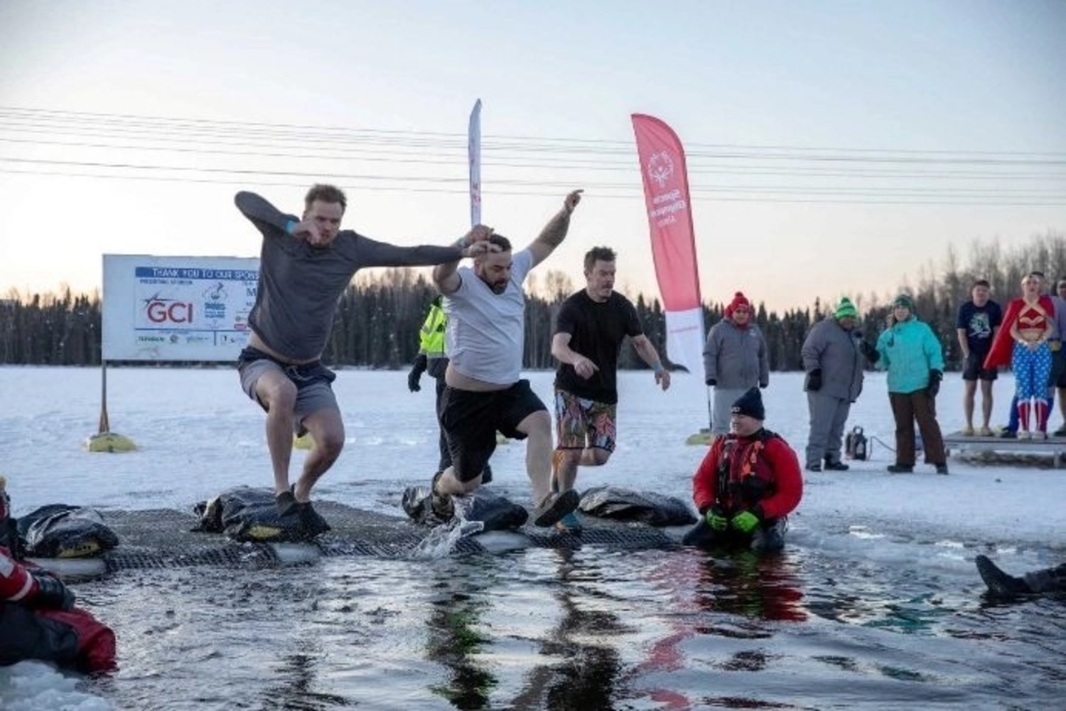 teammates from Renewal by Andersen of Alaska braved the elements to join the Special Olympics Polar Plunge.